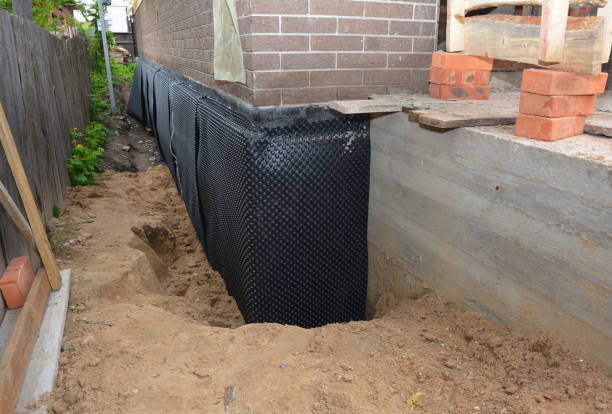 SJ Waterproofing Pros technician performing targeted Crawl Space Encapsulation assessment in Weaver, AL